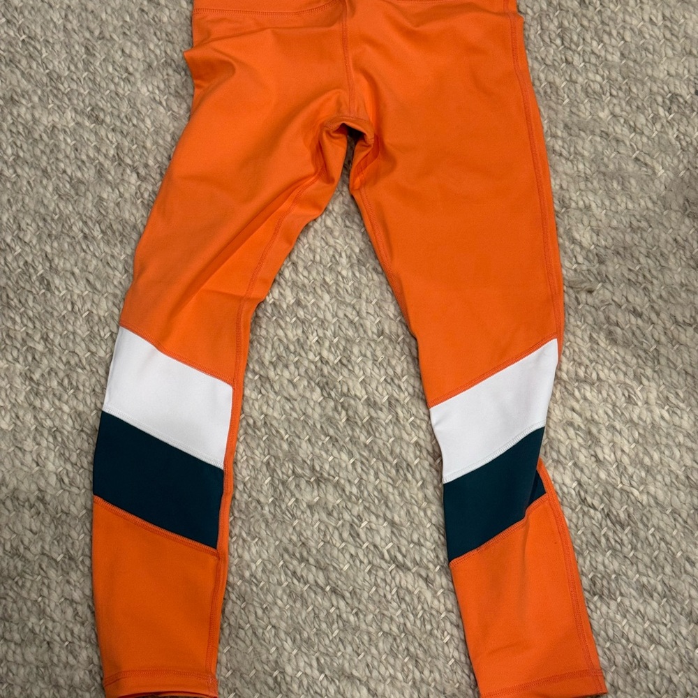 ZYIA women’s Orange Leggings with Color Block Design